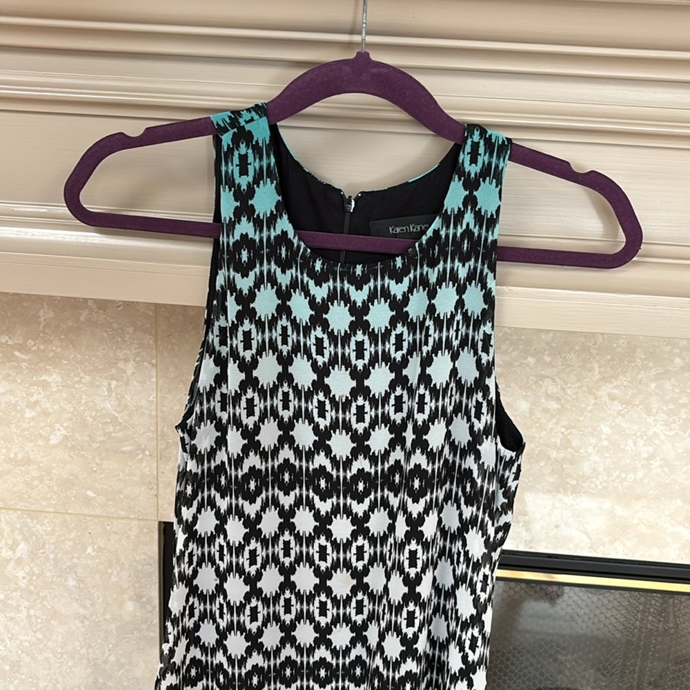 Karen Kane black/white/green print high-low sleeveless dress.